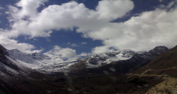 Clouds kissing snow mountains of Sikkim